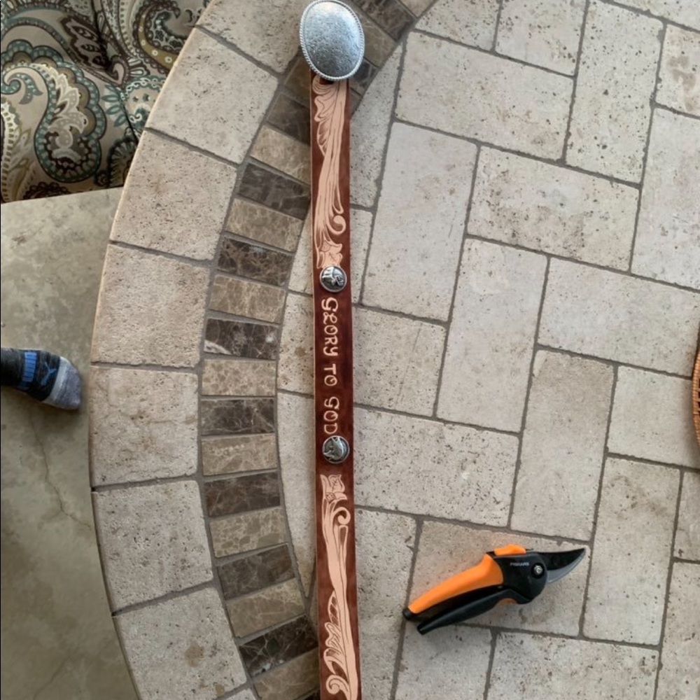 Hand tooled and painted leather belt